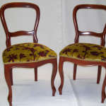 Two balloon chairs reupholstered in a French velvet fabric